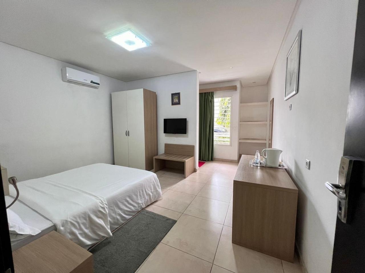 Residence Achenbach Abidjan Bagian luar foto